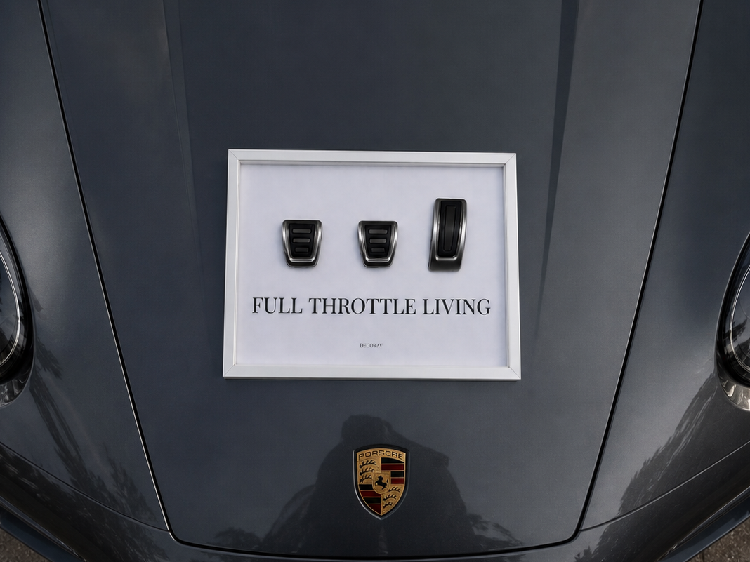 Car hood with a Porsche emblem and 'Full Throttle Living' decal.